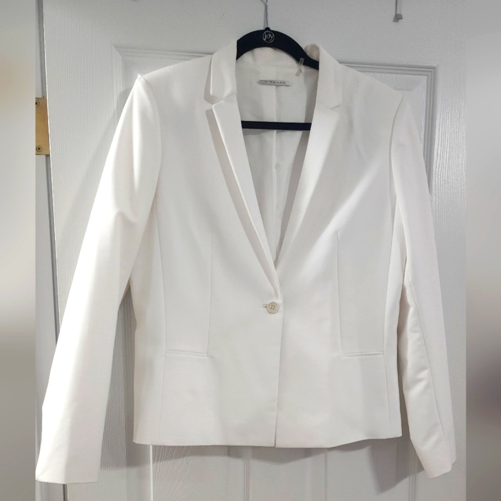 Never worn - Tahari, size 14 , ivory suit separate.